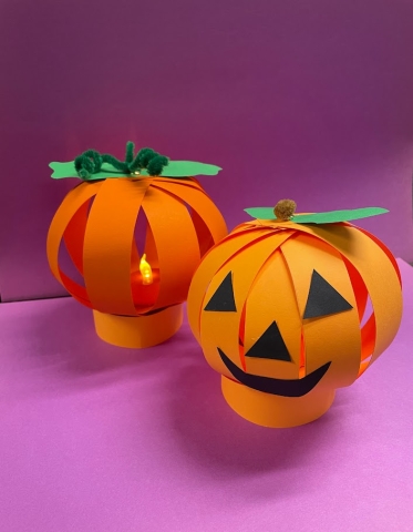 two paper pumpkin lanterns