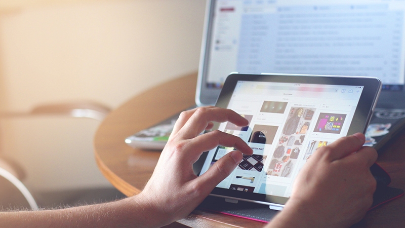 Person browsing on a tablet